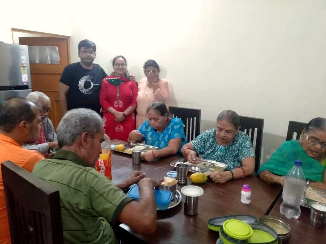 Triveni team members sharing a meal with residents at Tara Sansthan old age home